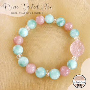 NINE TAILED FOX ROSE QUARTZ AND LARIMAR GEMSTONE LUCKY CHARM BRACELET