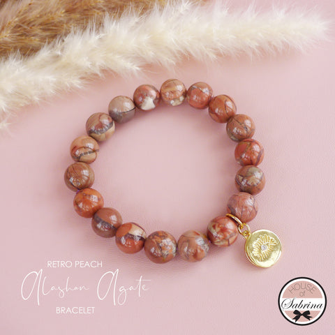 RETRO PEACH ALASHAN AGATE EVIL EYE GEMSTONE BRACELET